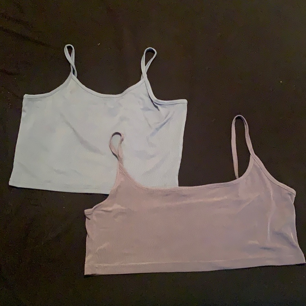 Two crop tops. One blue one purple. Never worn. Good condition